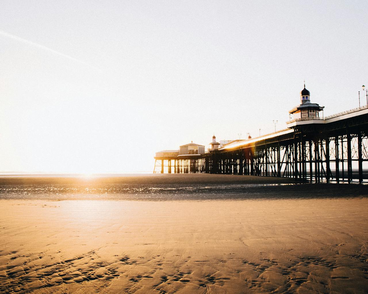 The golden sand and pier at Blackpool Beach The golden sand and pier at Blackpool Beach