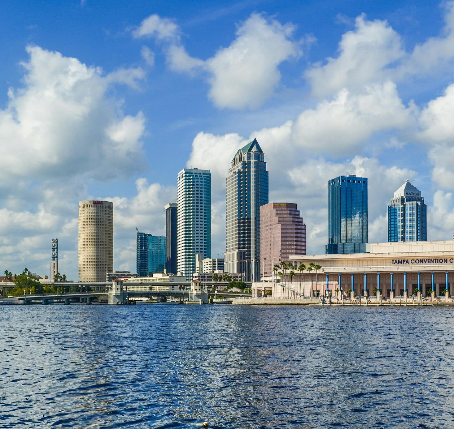 The Tampa cityscape with tall buildings on the river