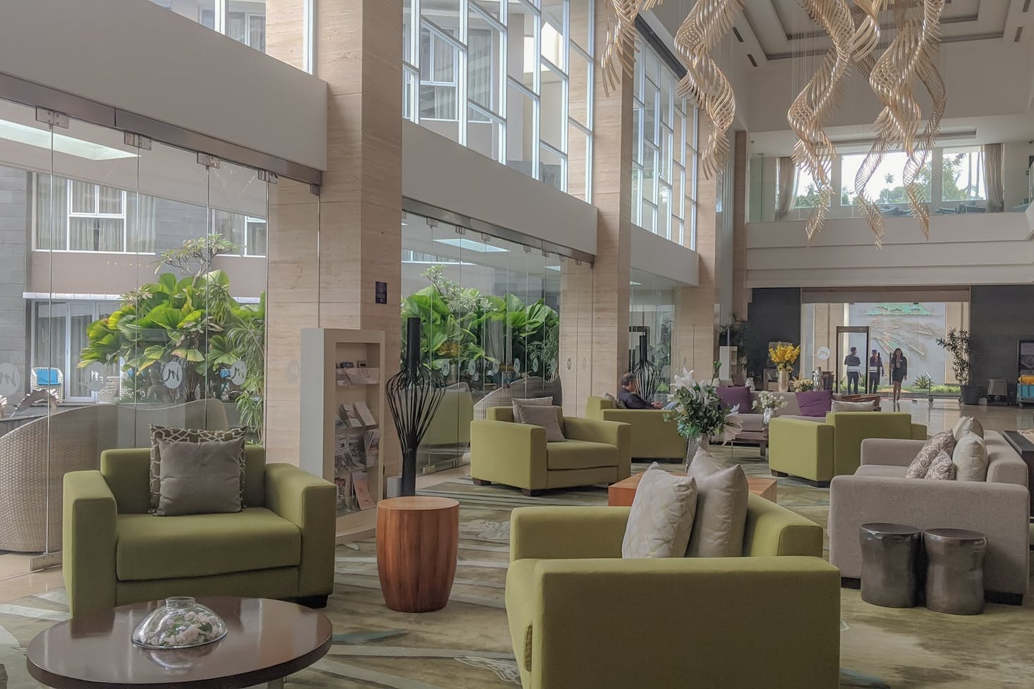 Hotel lobby or lounge with many sofas