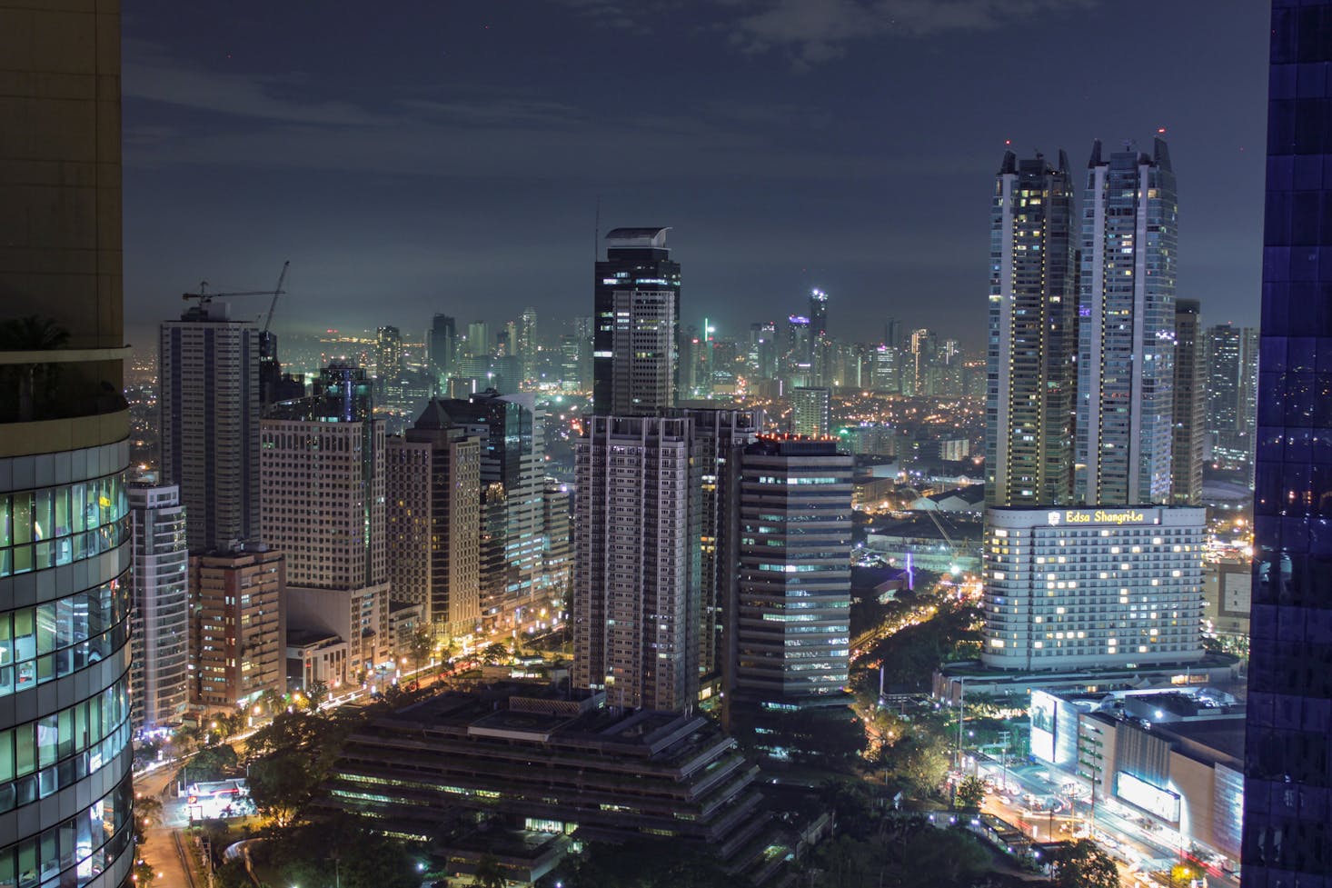 City view of Manila at night with skyscrapers