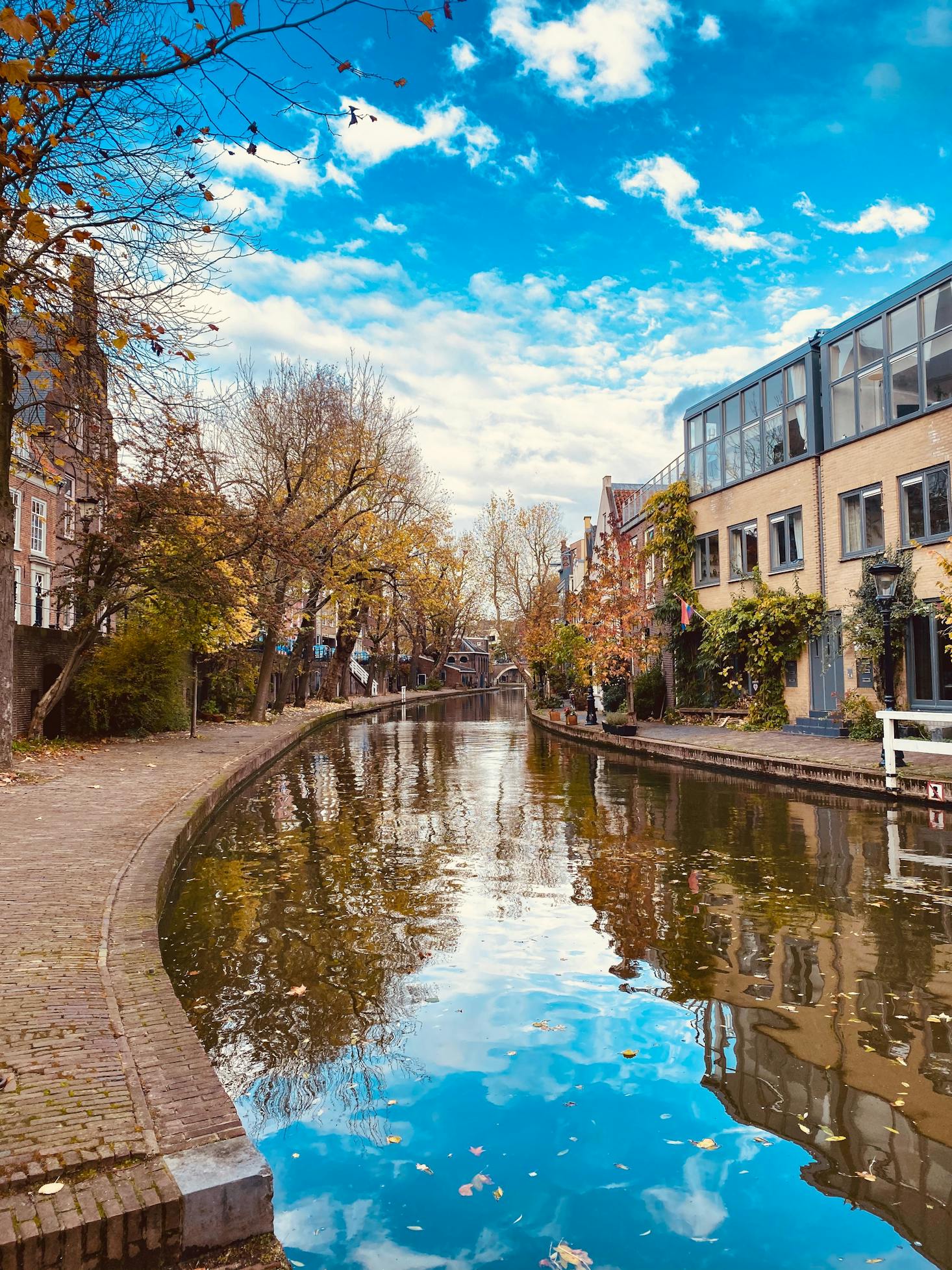 The calm waters of the Oudegracht Canal in Utrecht on a sunny day