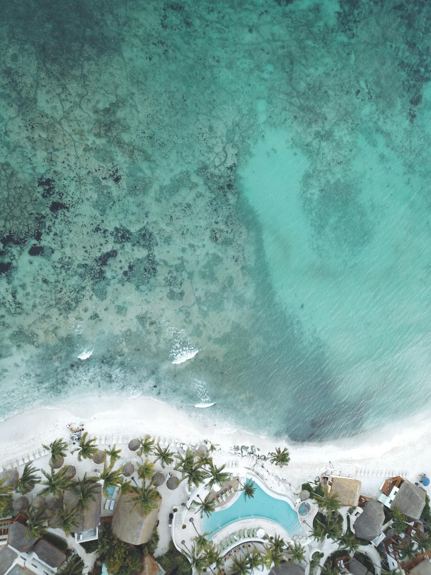 The clear waters and crashing waves near Playa del Carmen Airport