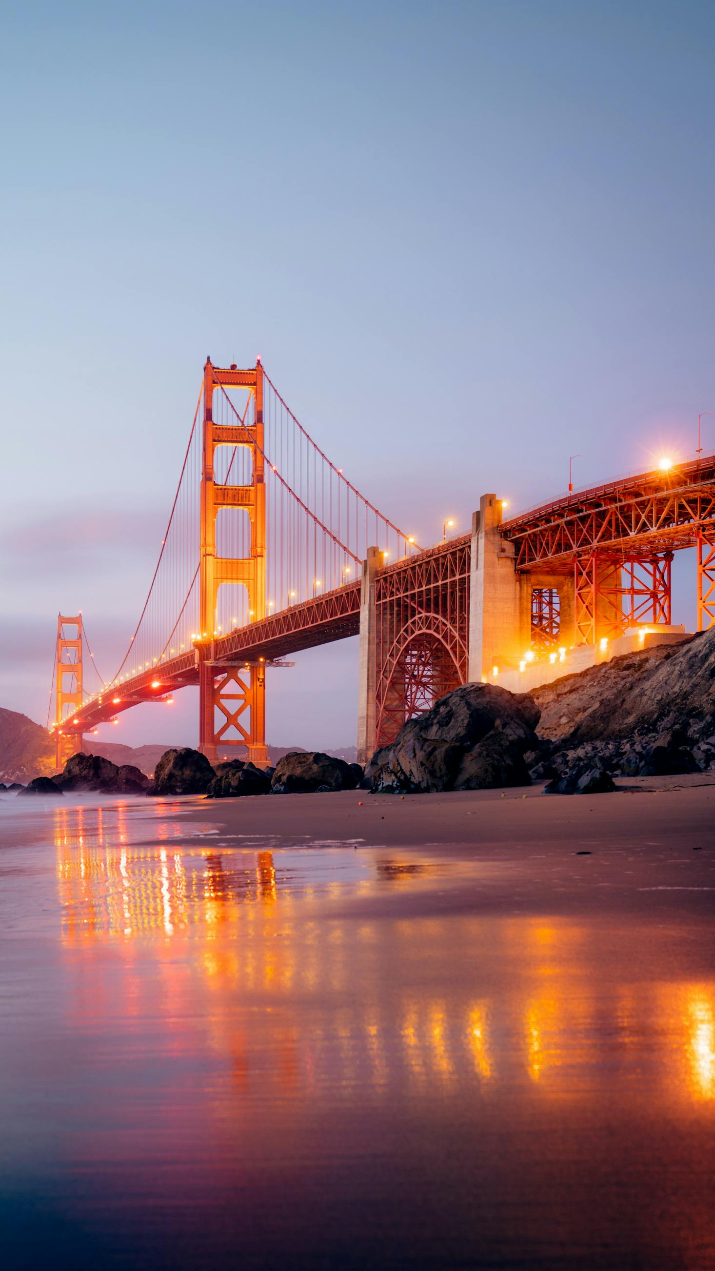 The Golden Gate Bridge spanning the Golden Gate Strait at dusk in San Francisco