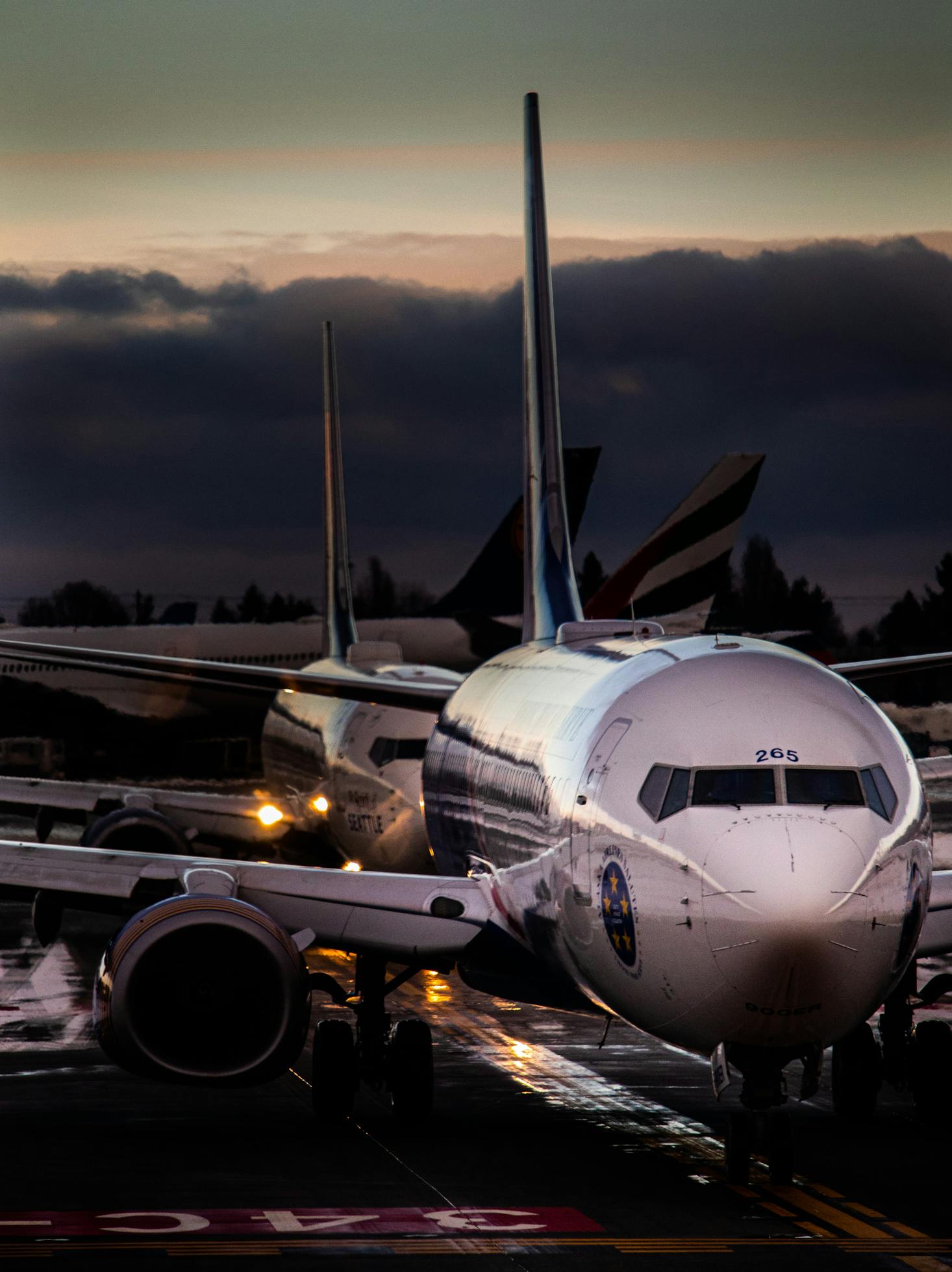 Plane on the tarmac at dusk at Seattle Airport