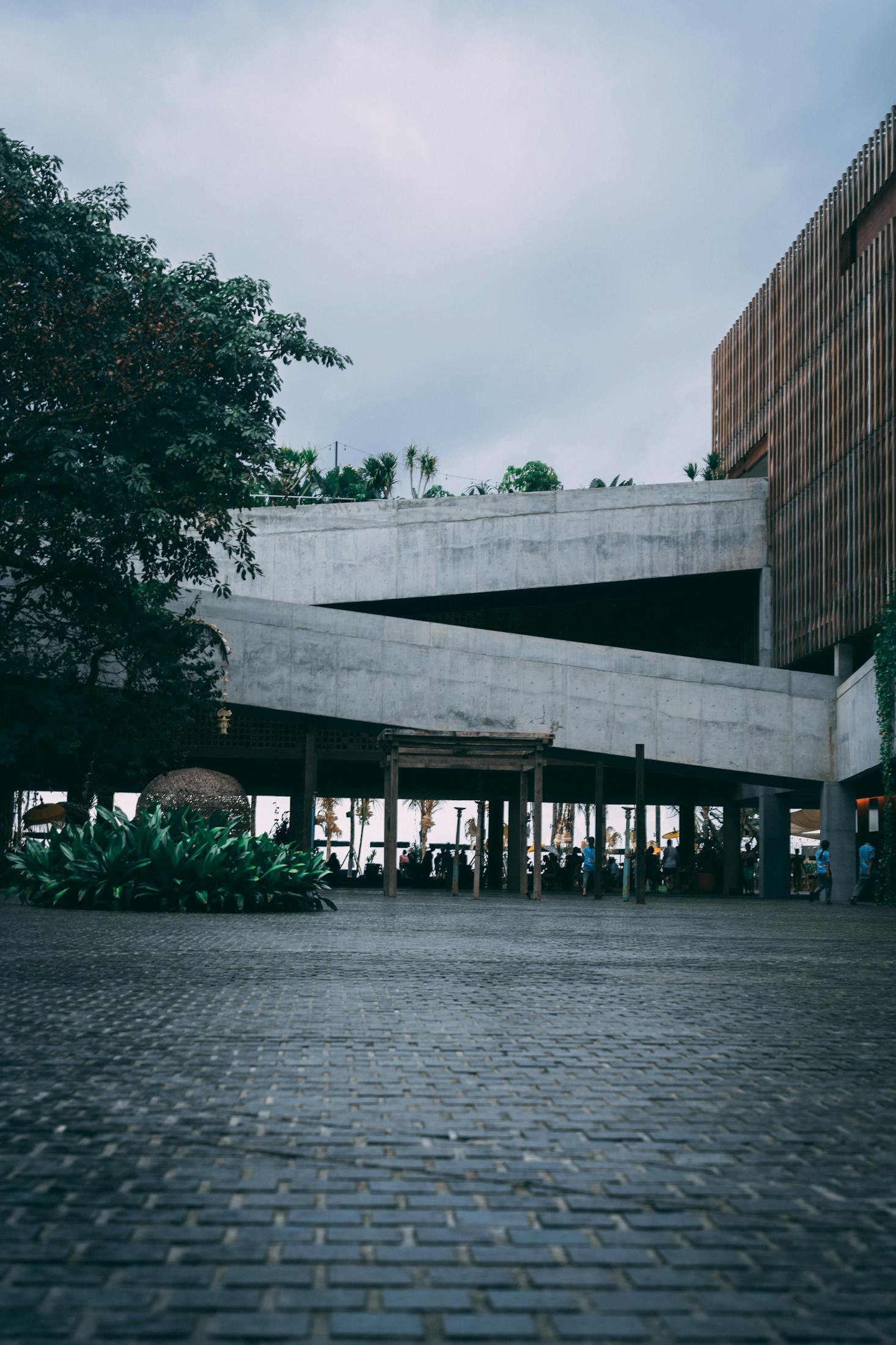 Concrete building with green plants in Seminyak, Bali