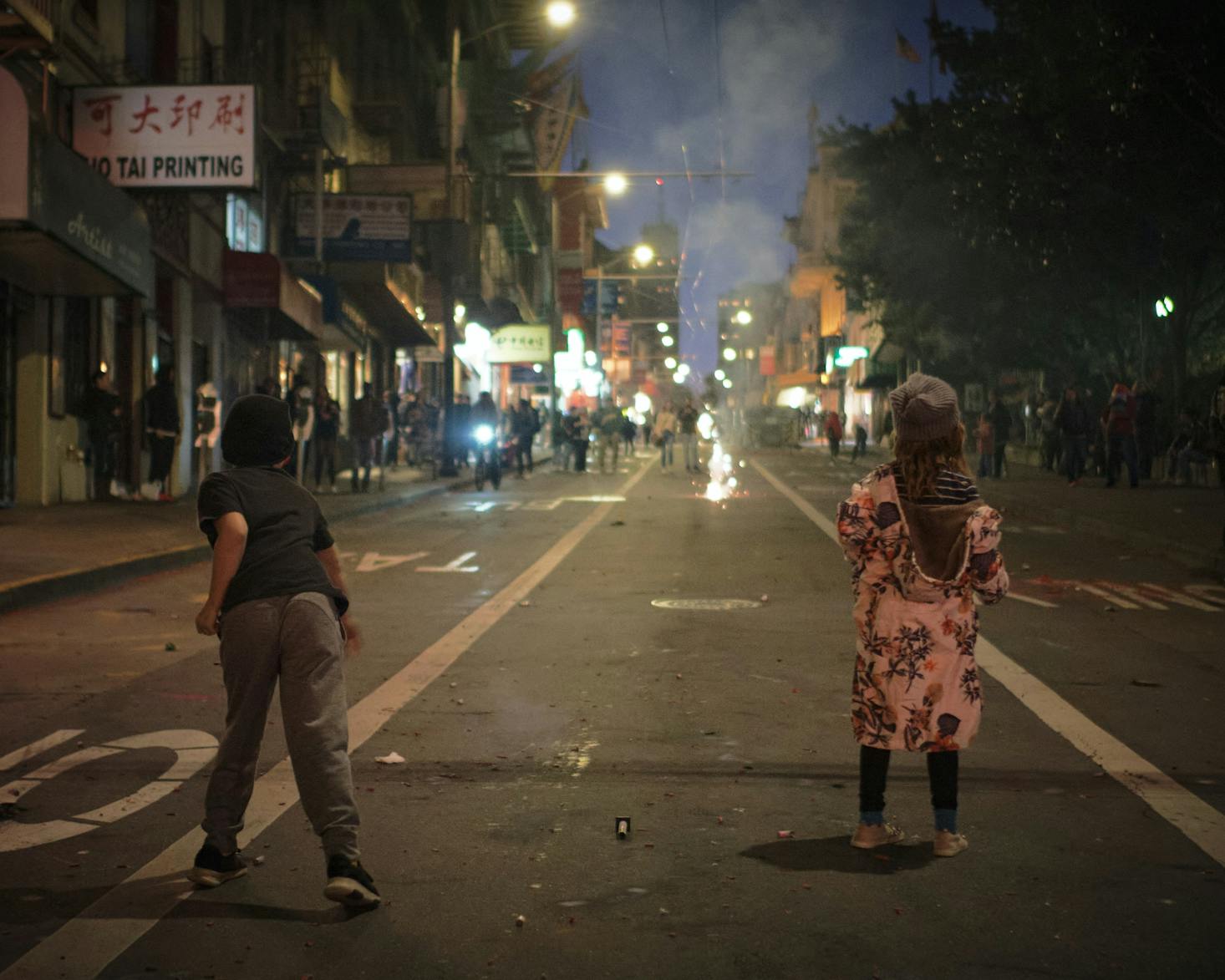 Kids playing with fireworks in San Francisco