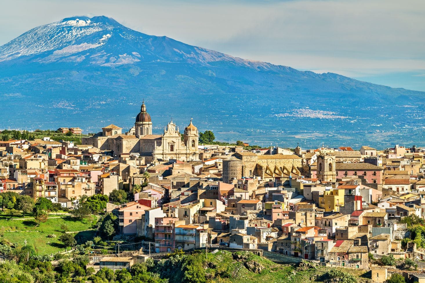 A panoramic view of the Catania's skyline and the Mount Etna in the background