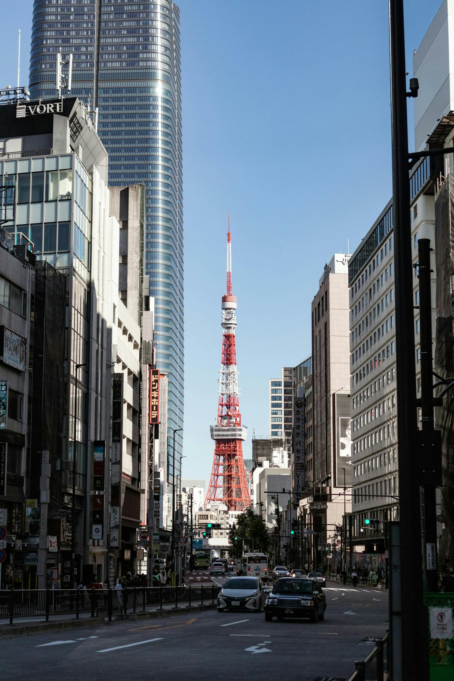 Tokyo Tower at the end of a building-lined street near Roppongi Station