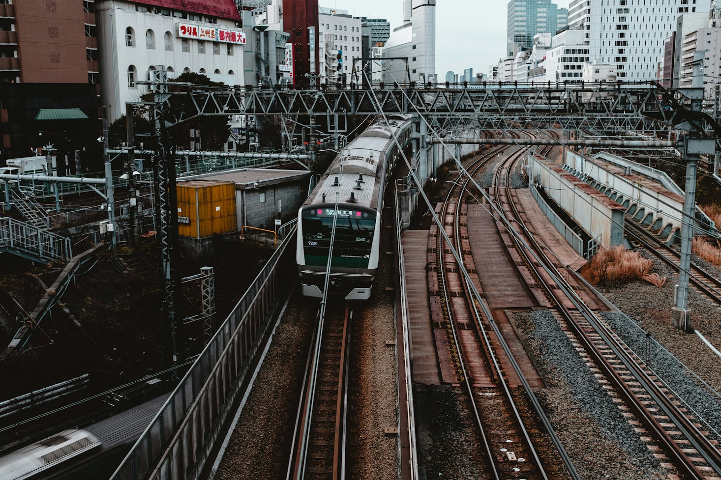 A train arriving on the tracks at Ikebukuro Station in Tokyo