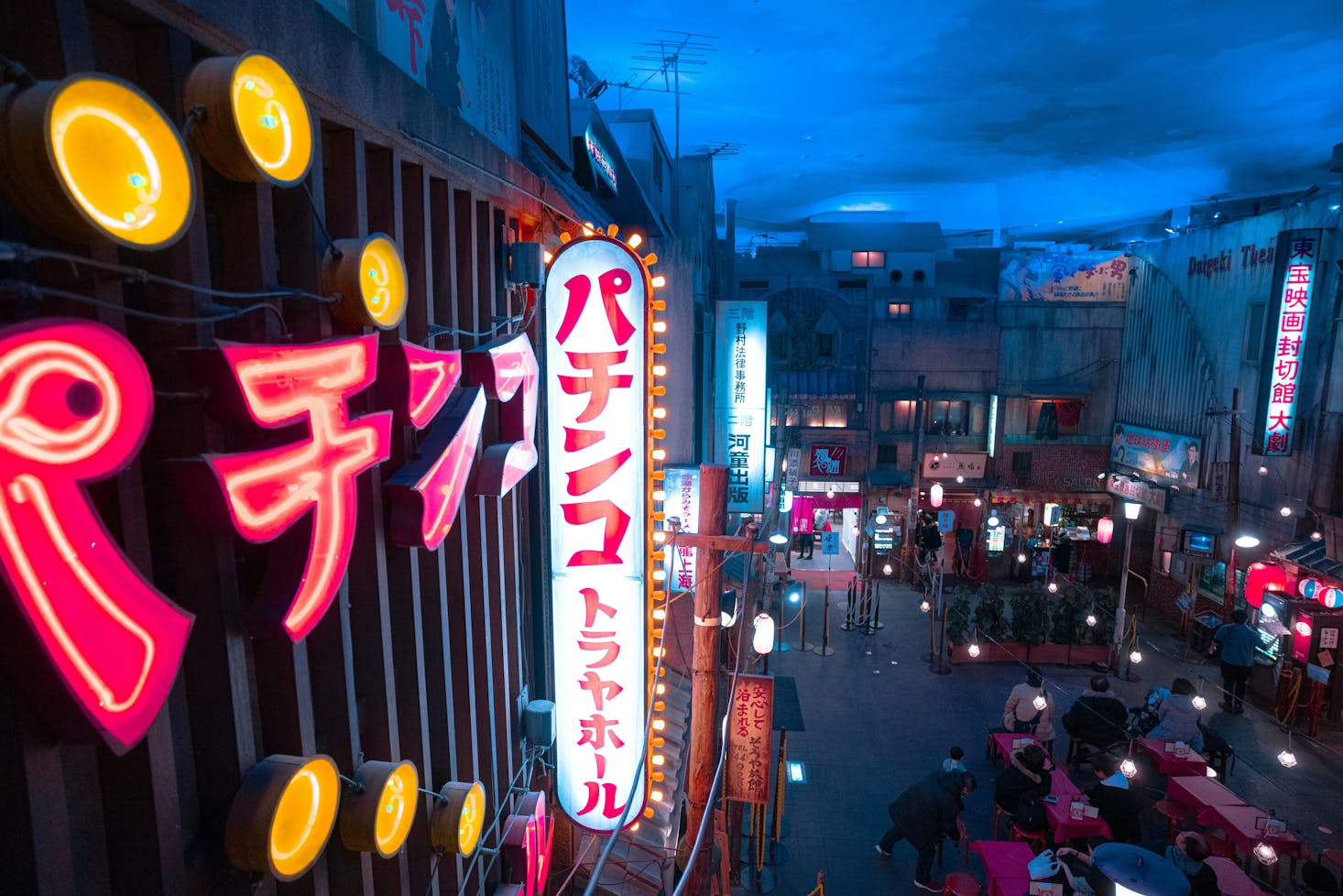 Bright neon lights and signs at night near Shin-Yokohama Station