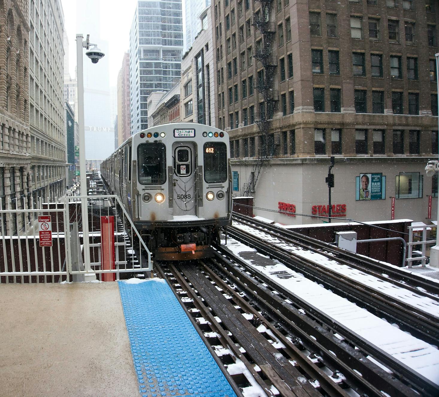 Taking the train in downtown Chicago on a snowy day