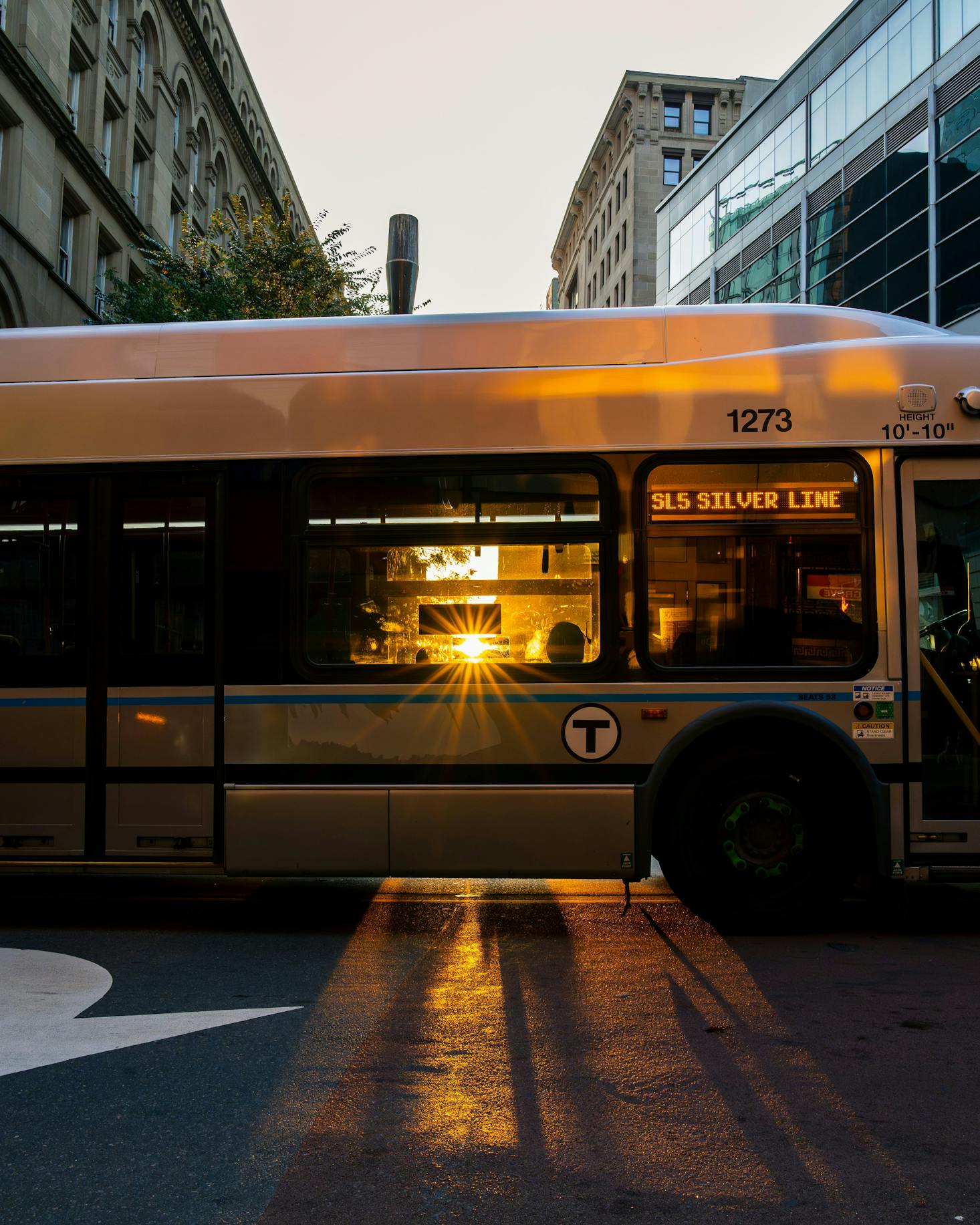 A Silver Line bus in Boston at sunset