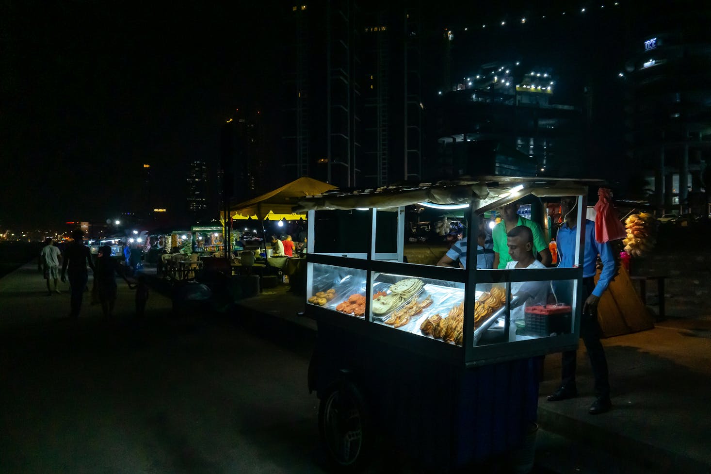 A street food vendor at Galle Face Green in Colombo at night