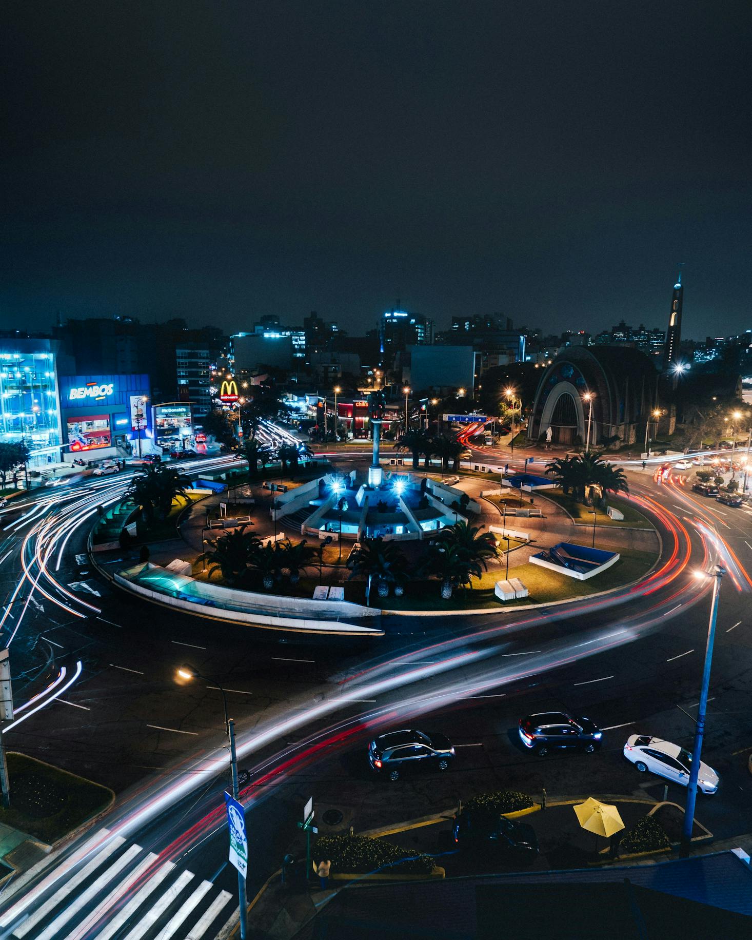 A roundabout in the Miraflores district of Lima at night