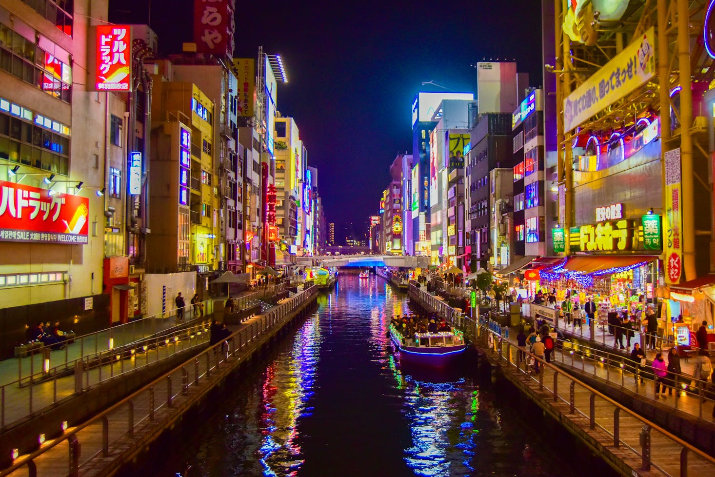 Boat on a canal in Osaka at night