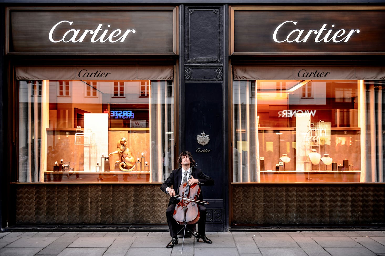 A cello player outside the Cartier store in Vienna