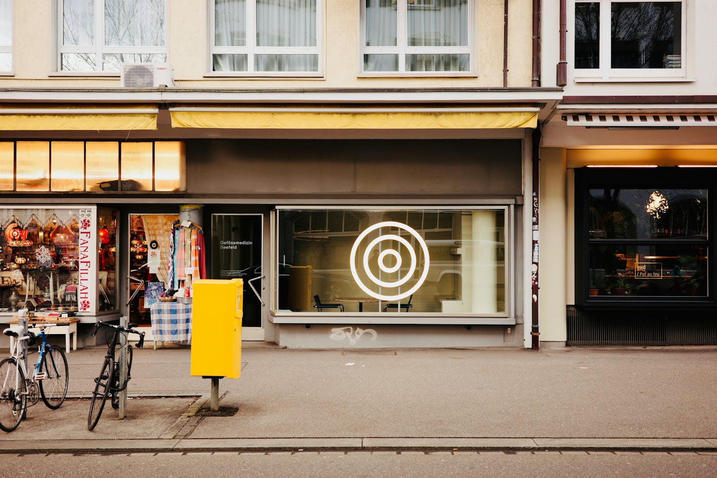 Shops along the street during the day in Zurich