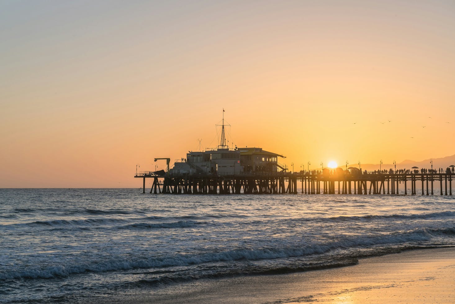 Light waves at the Santa Monica Pier at sunset