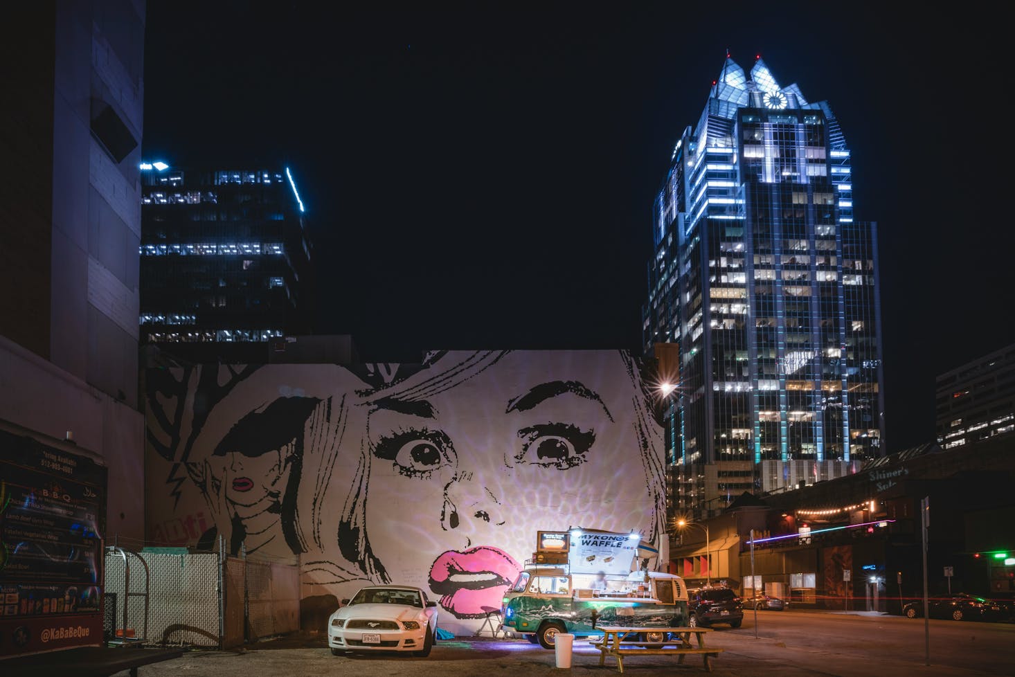 Colorful mural in downtown Austin at night