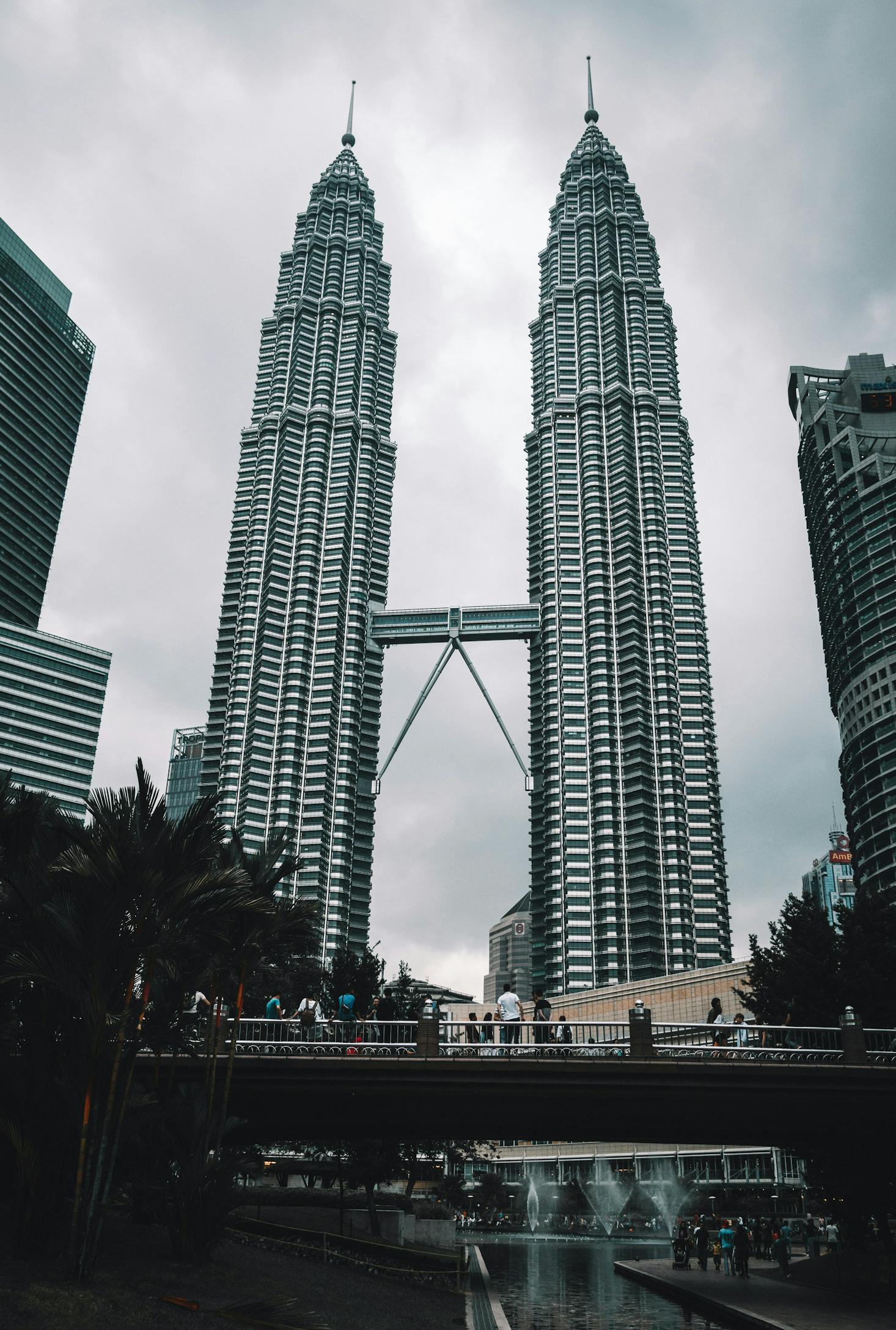 The Petronas Twin Towers on a cloudy day in Kuala Lumpur