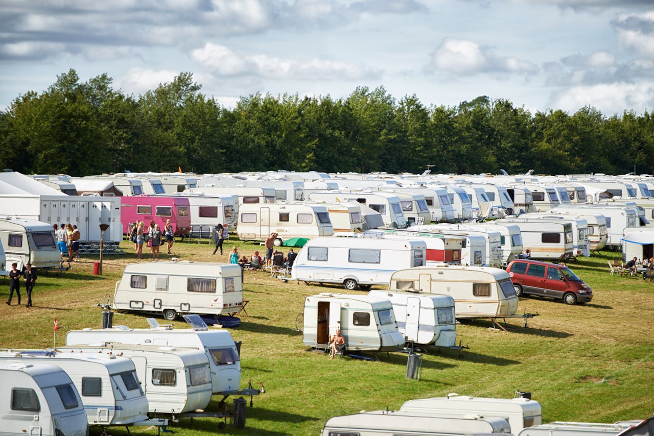 Rows of caravans and motorhomes at an outdoor exhibition