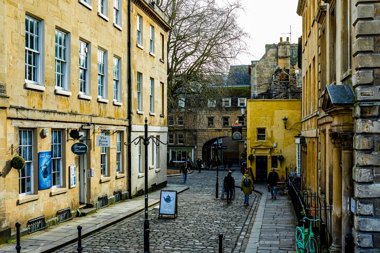 Street shopping among yellow buildings in Bath