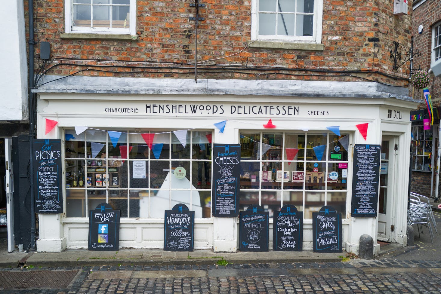 An old-fashioned deli in York selling cheese, meat, and other food items