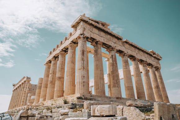 Low angle view of the Parthenon marble ruins in Athens during a sunny day