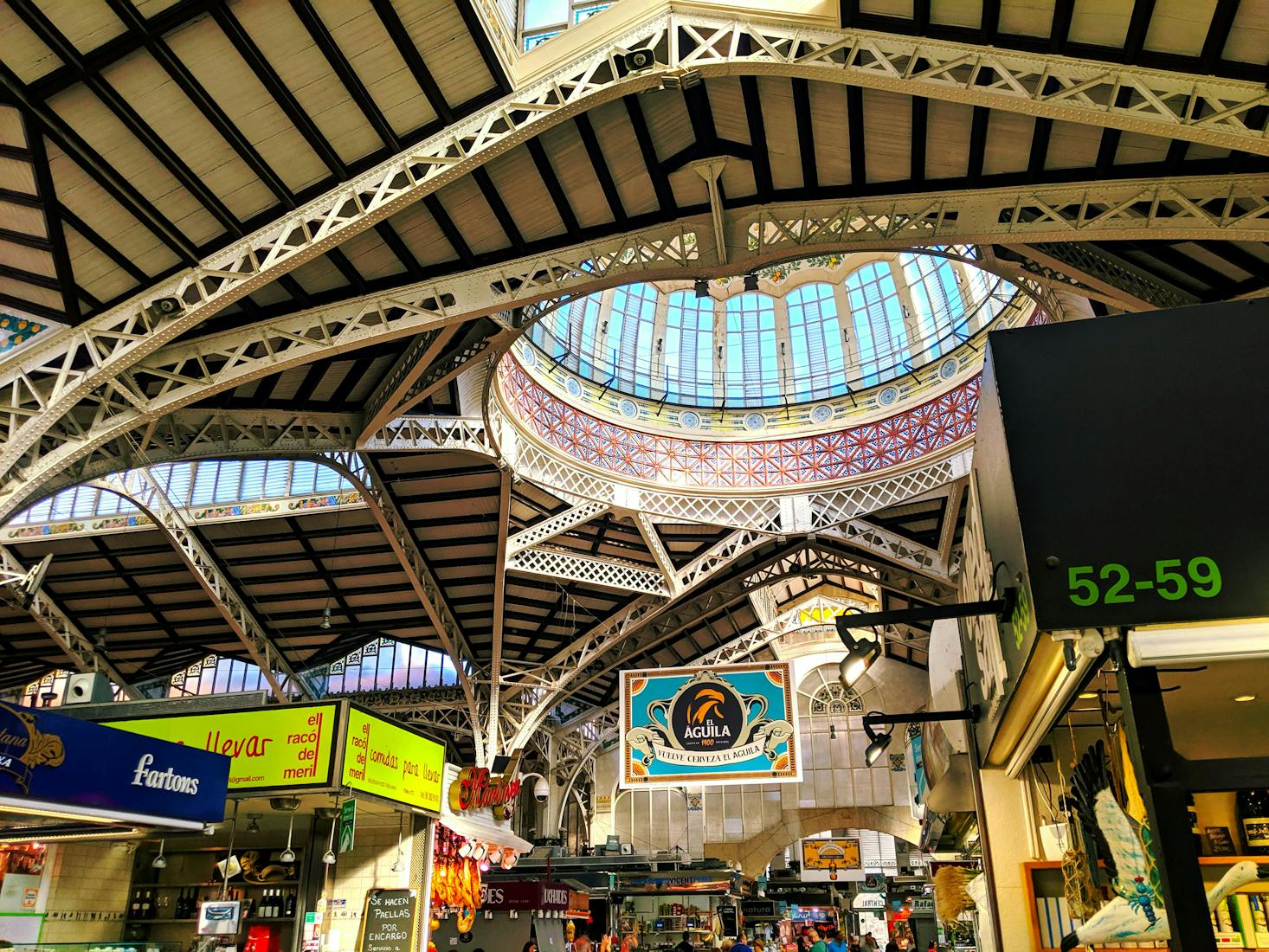  The ceiling of the Central Market of Valencia and a few market stalls