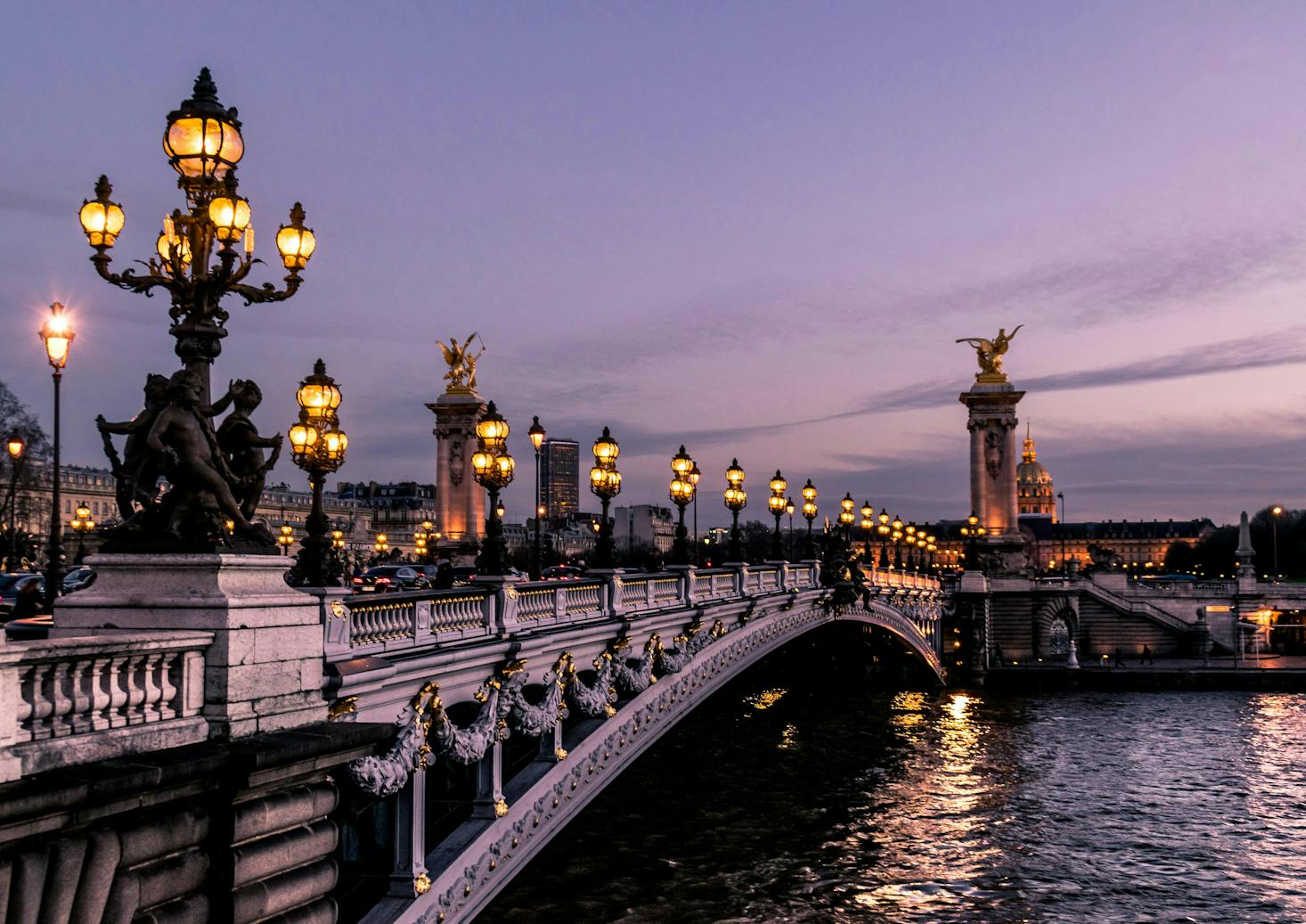 Romantic Parisian bridgee at dusk