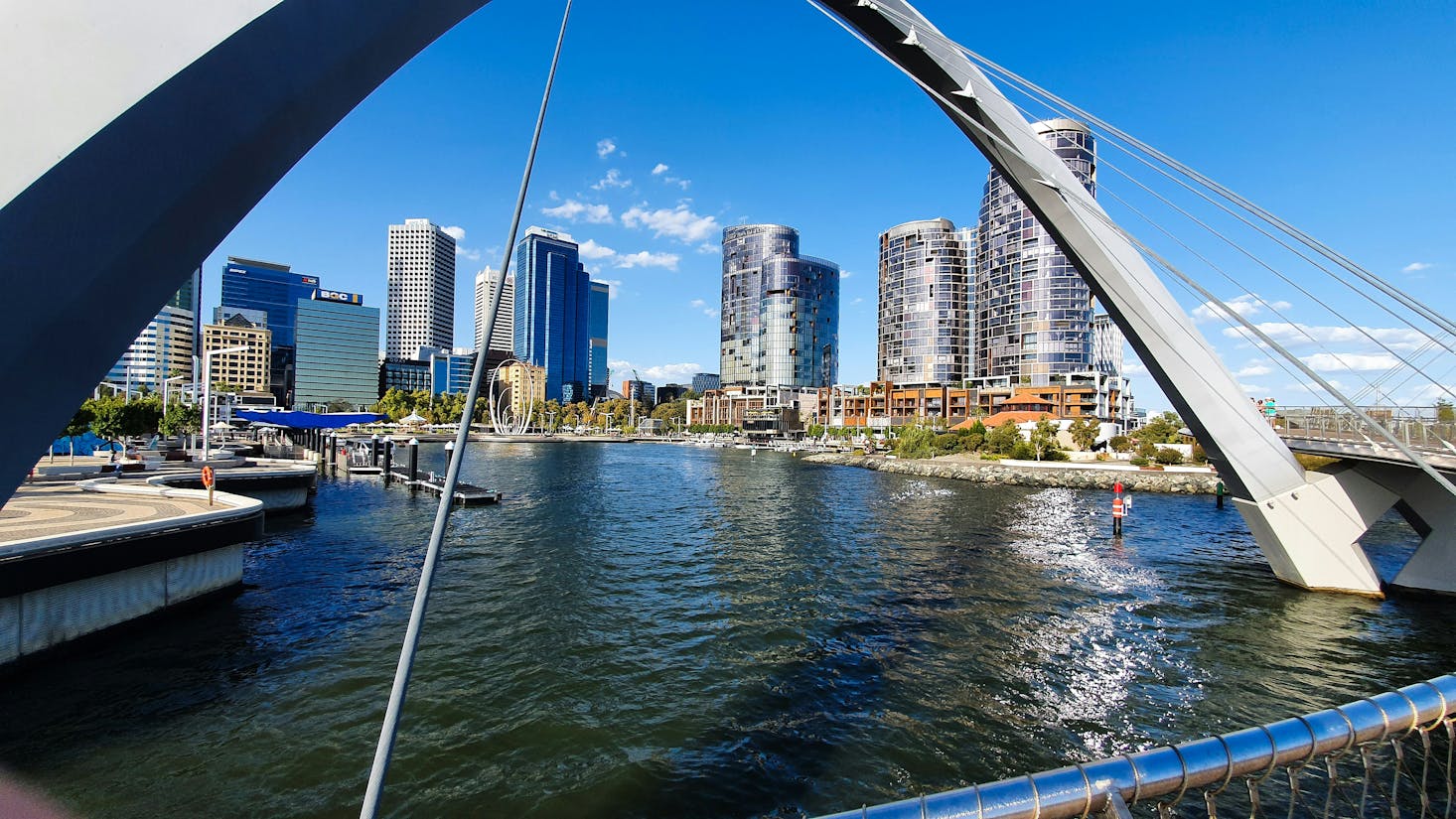 The arch of Elizabeth Quay in Perth with the cityscape in the distance