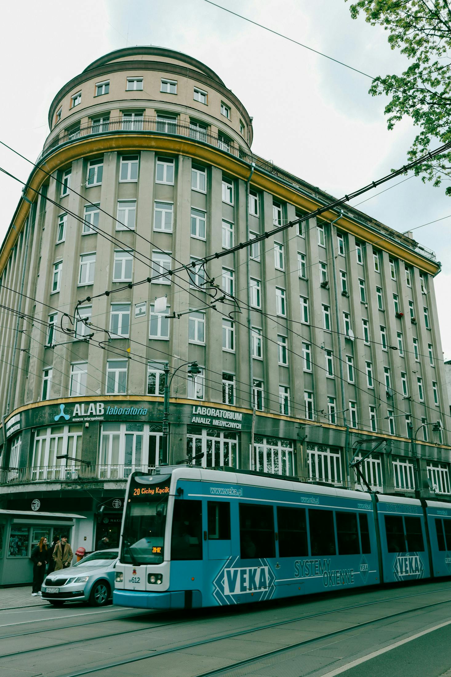 Tram heading to Krakow Bus Station on a cloudy day