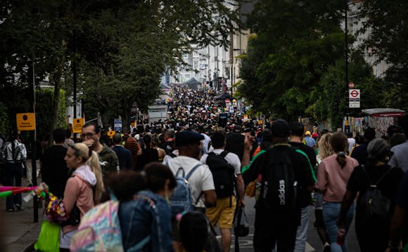 A crowded outdoor festivity during the Spring Fiesta in the Park