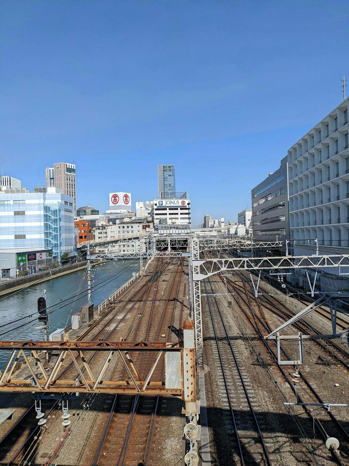 Train tracks near Yokohama Station on a sunny day