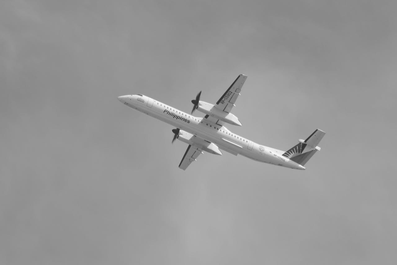 Plane in the sky after takeoff from Cebu Airport