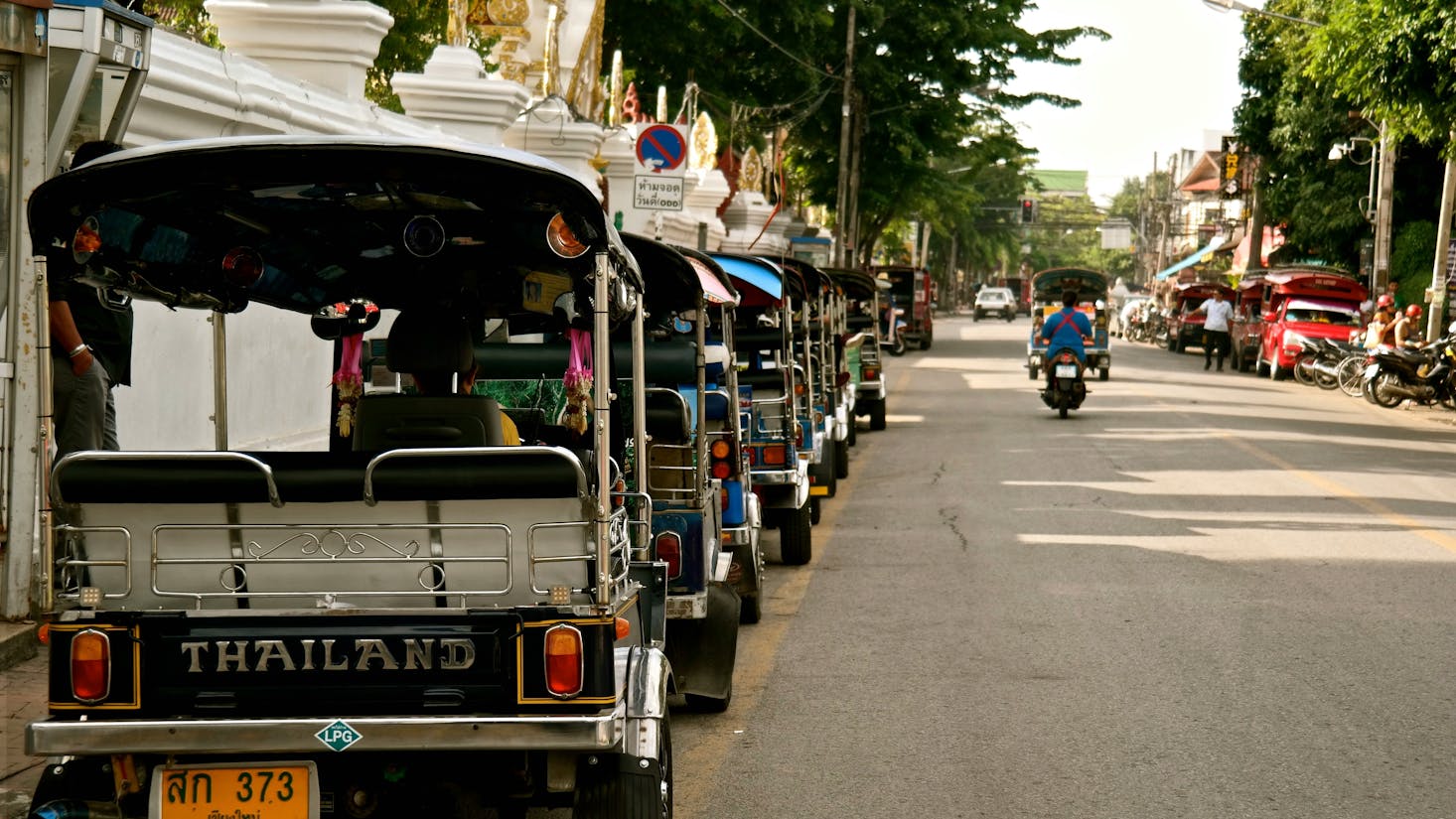 Tuk-tuks lined up near Chiang Mai Bus Station