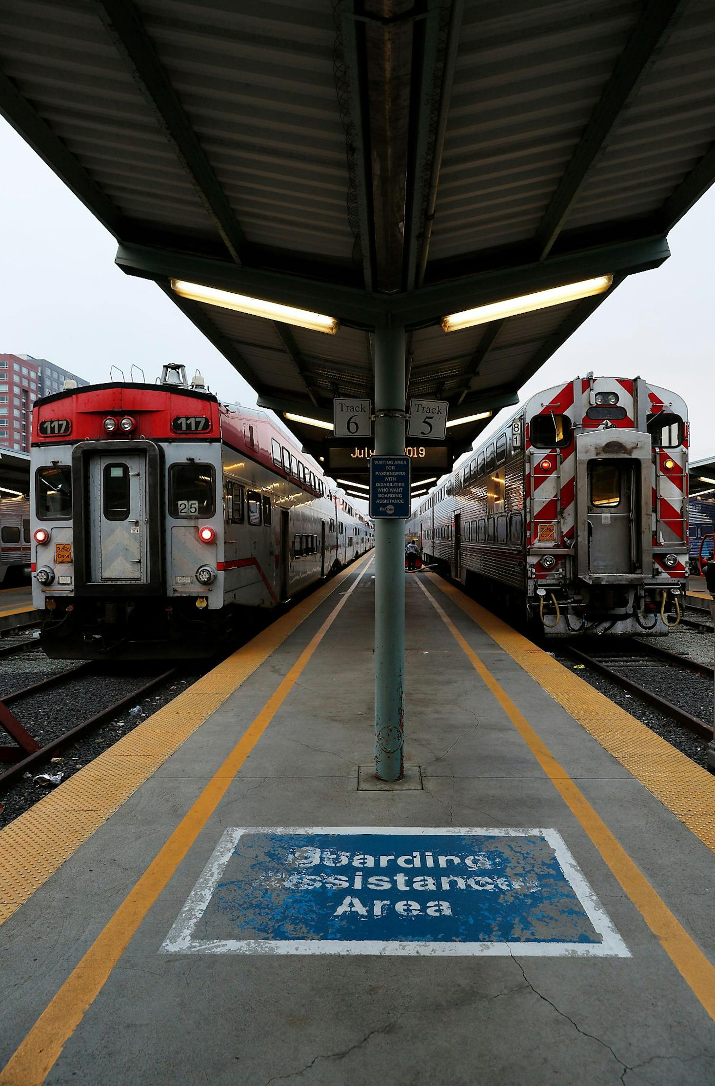 Caltrain Station platform with modern trains arriving