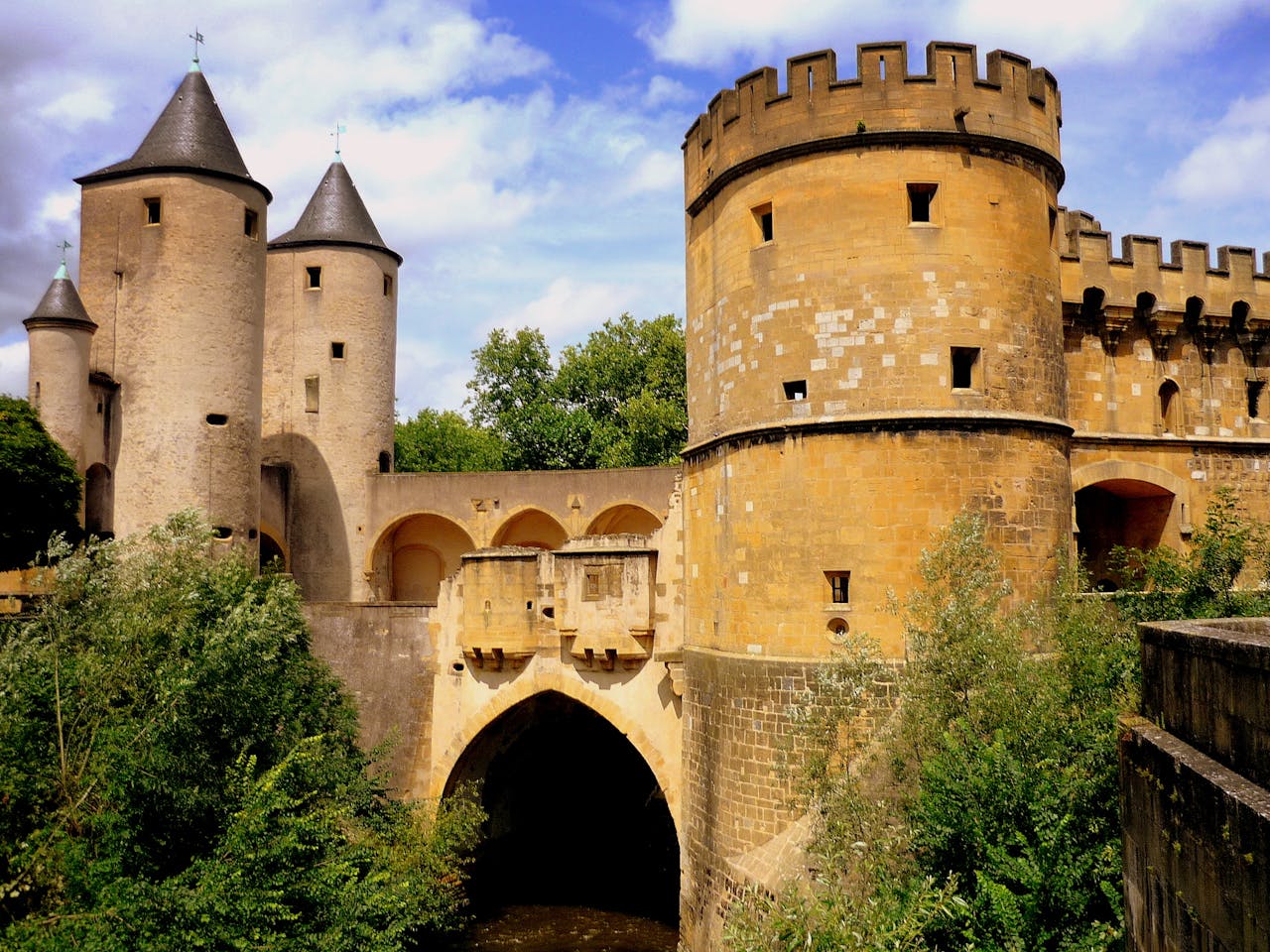 The historic and imposing towers of the medieval bridge at Metz, France. The historic and imposing towers of the medieval bridge at Metz, France.