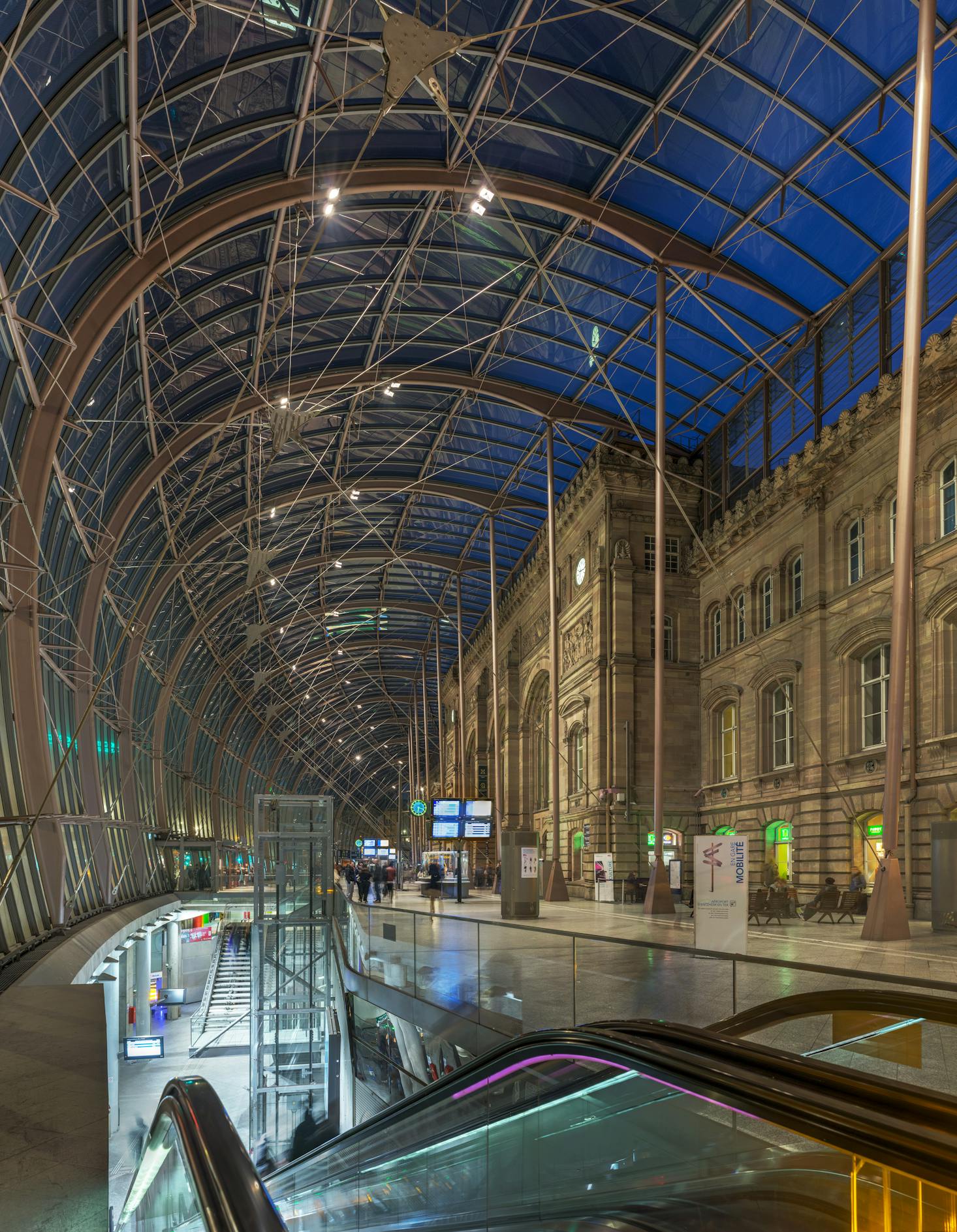 The beautifully illuminated interior of Strasbourg train station in France.