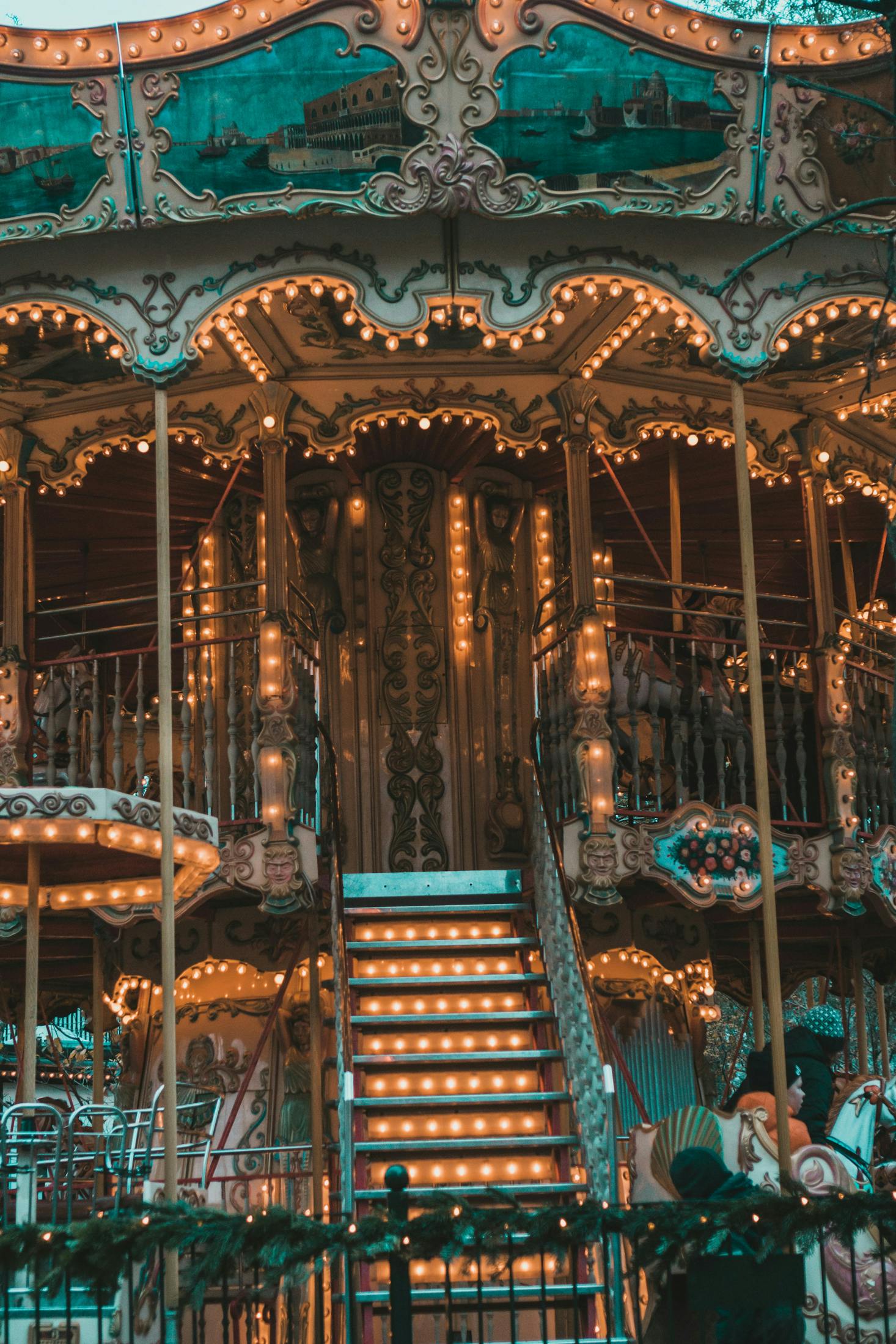 A beautifully illuminated vintage carousel to ride in Tivoli.