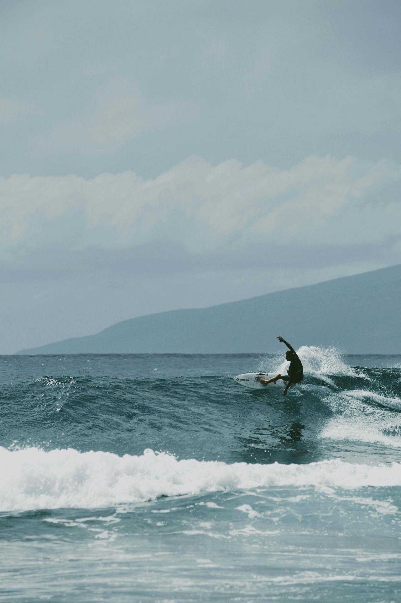 Surfing in one of the beaches of Lahaina.