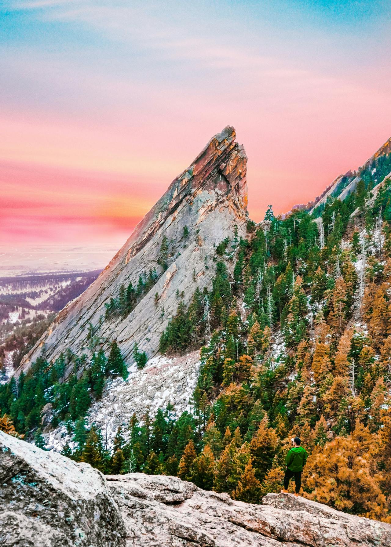 A breathtaking view of the Flatirons at sunrise in Boulder, Colorado.