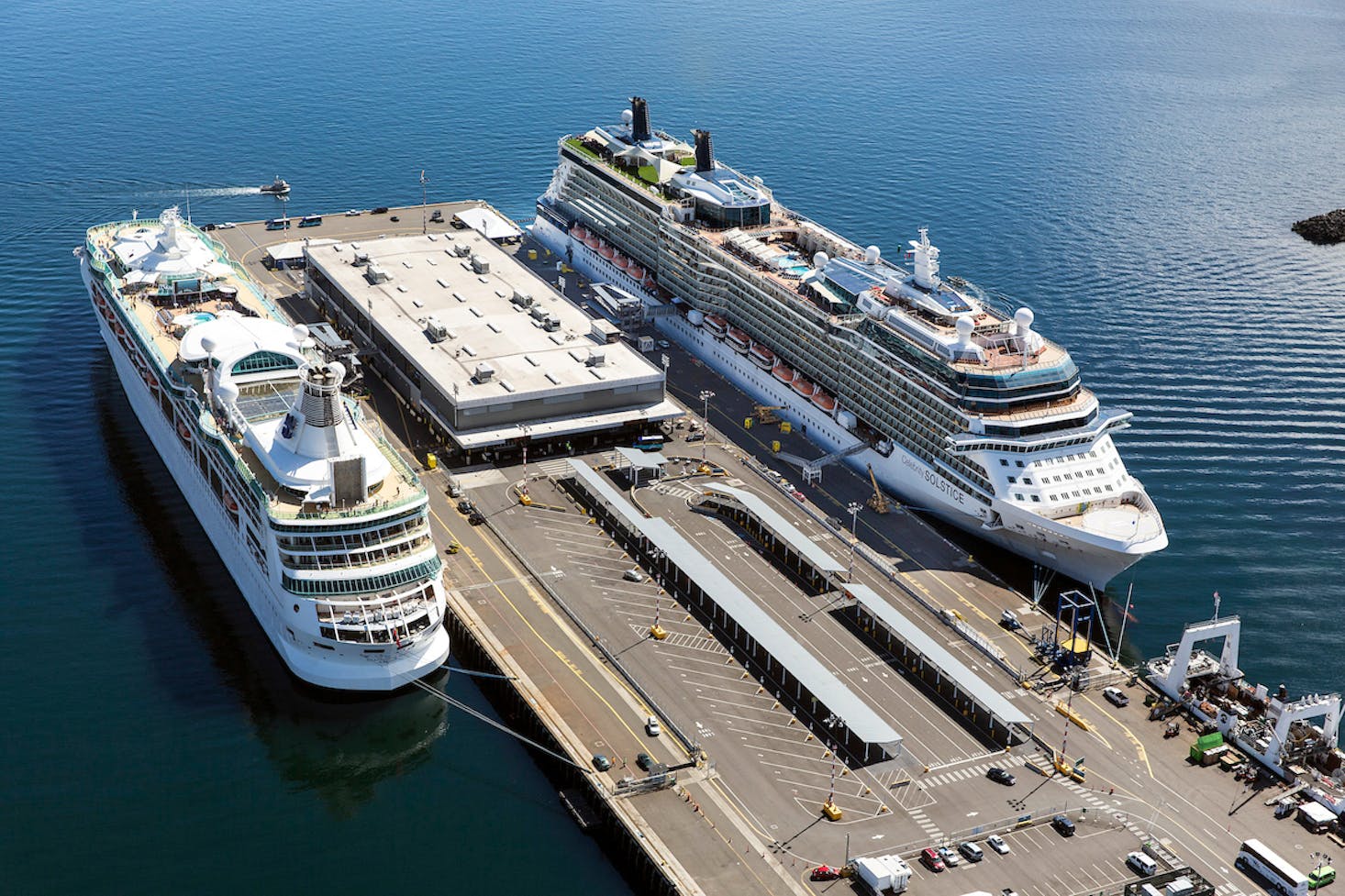 Two large cruise ships docked at Pier 91 in Seattle