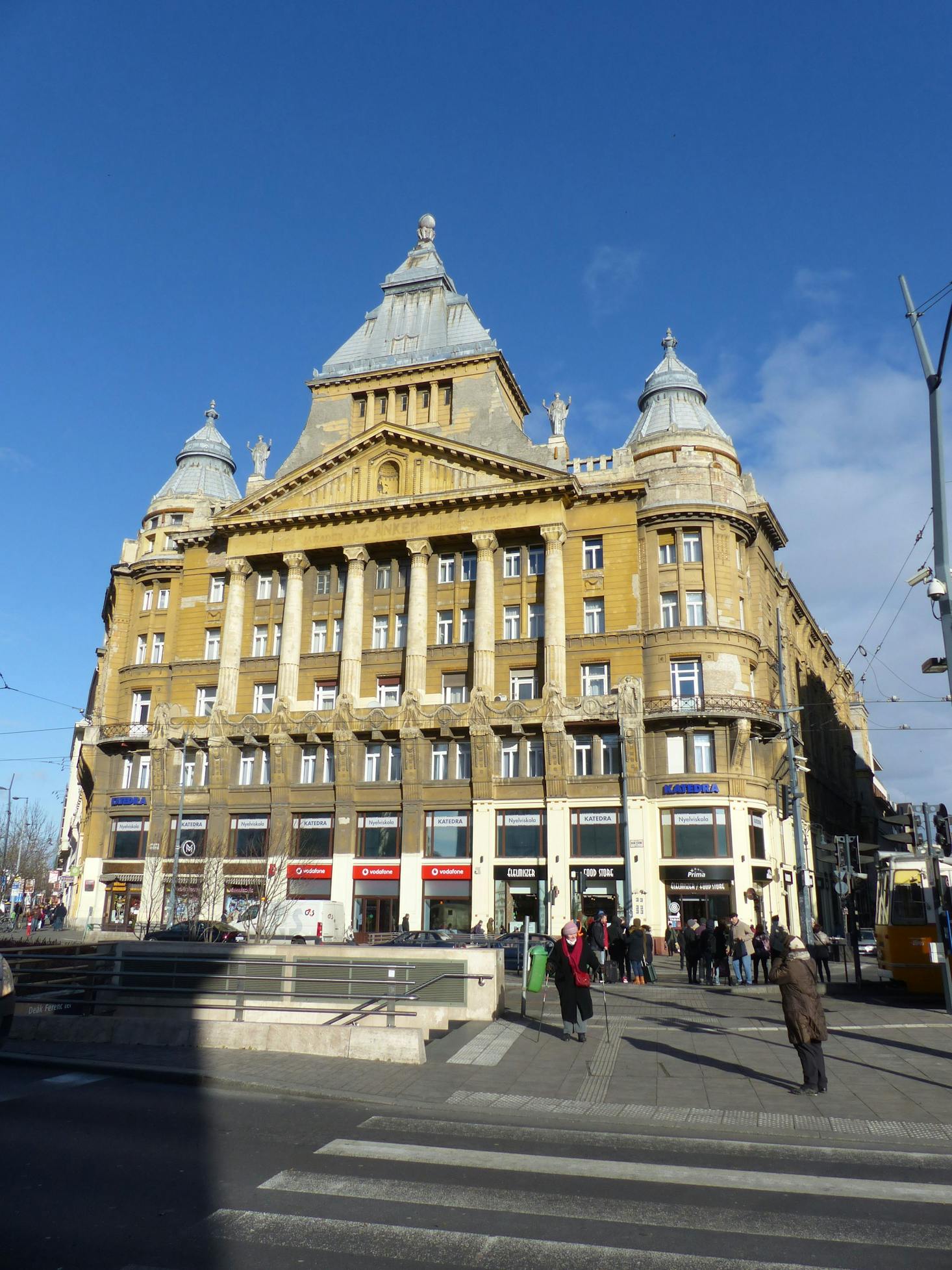 Historic building with ornate architectural details at Deák Ferenc tér in Budapest