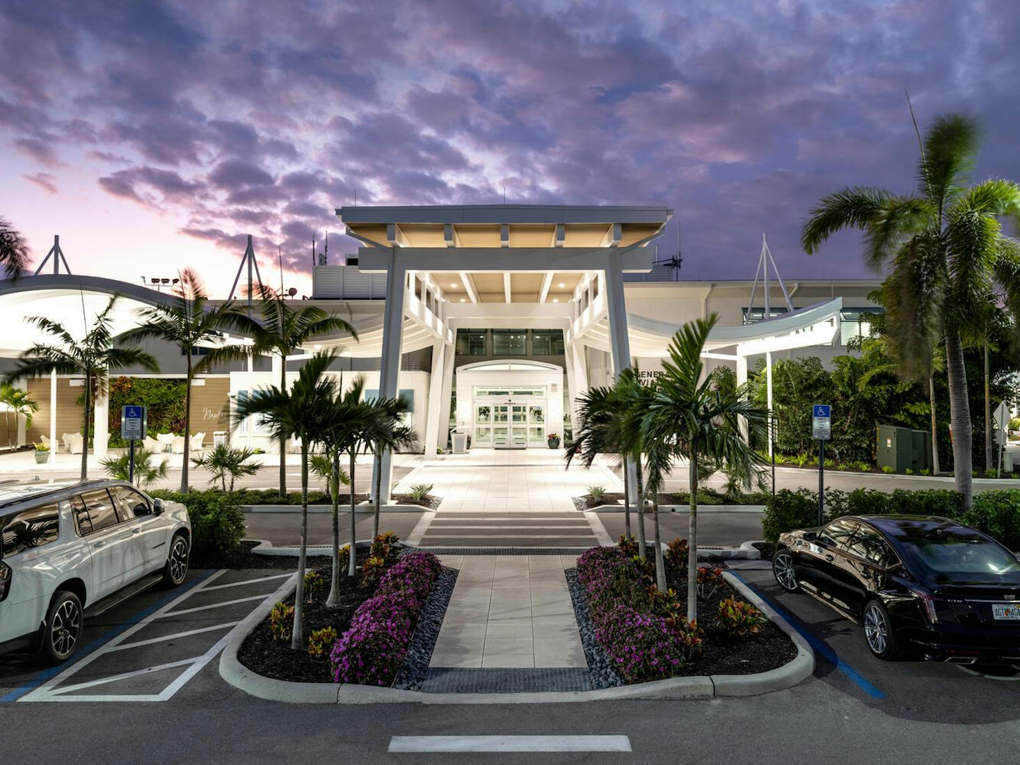 Exterior of Naples International Airport with a grand entrance