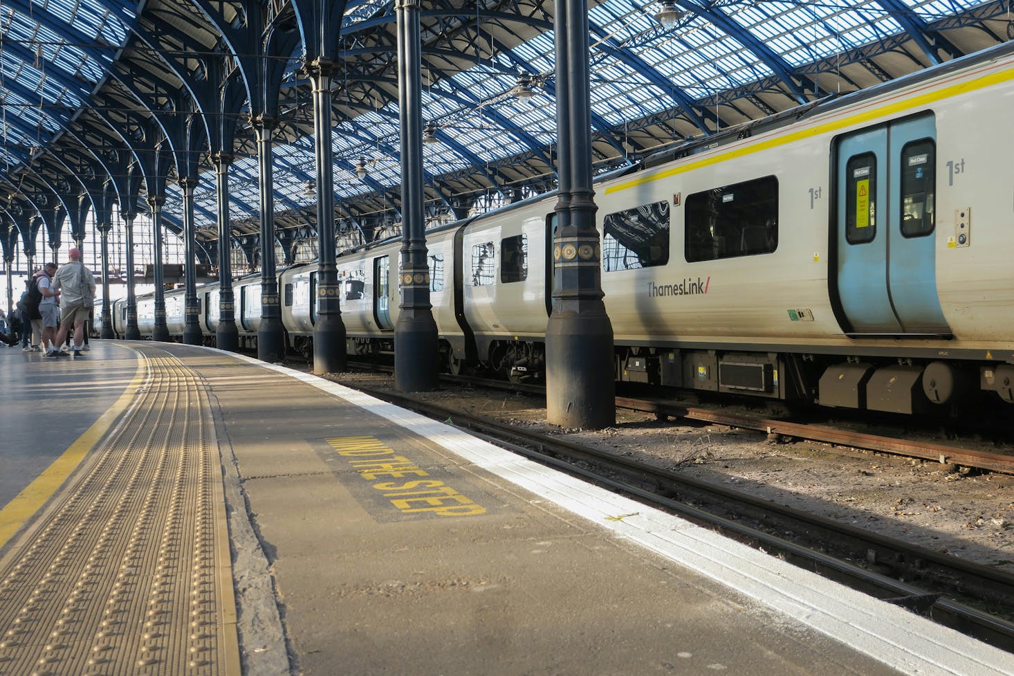 AThamesLink train at a platform inside Brighton Train Station