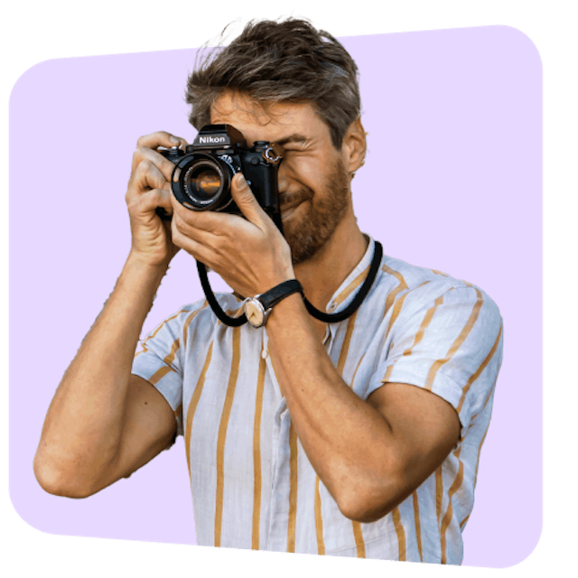 A man takes photos while he enjoys his day luggage-free.