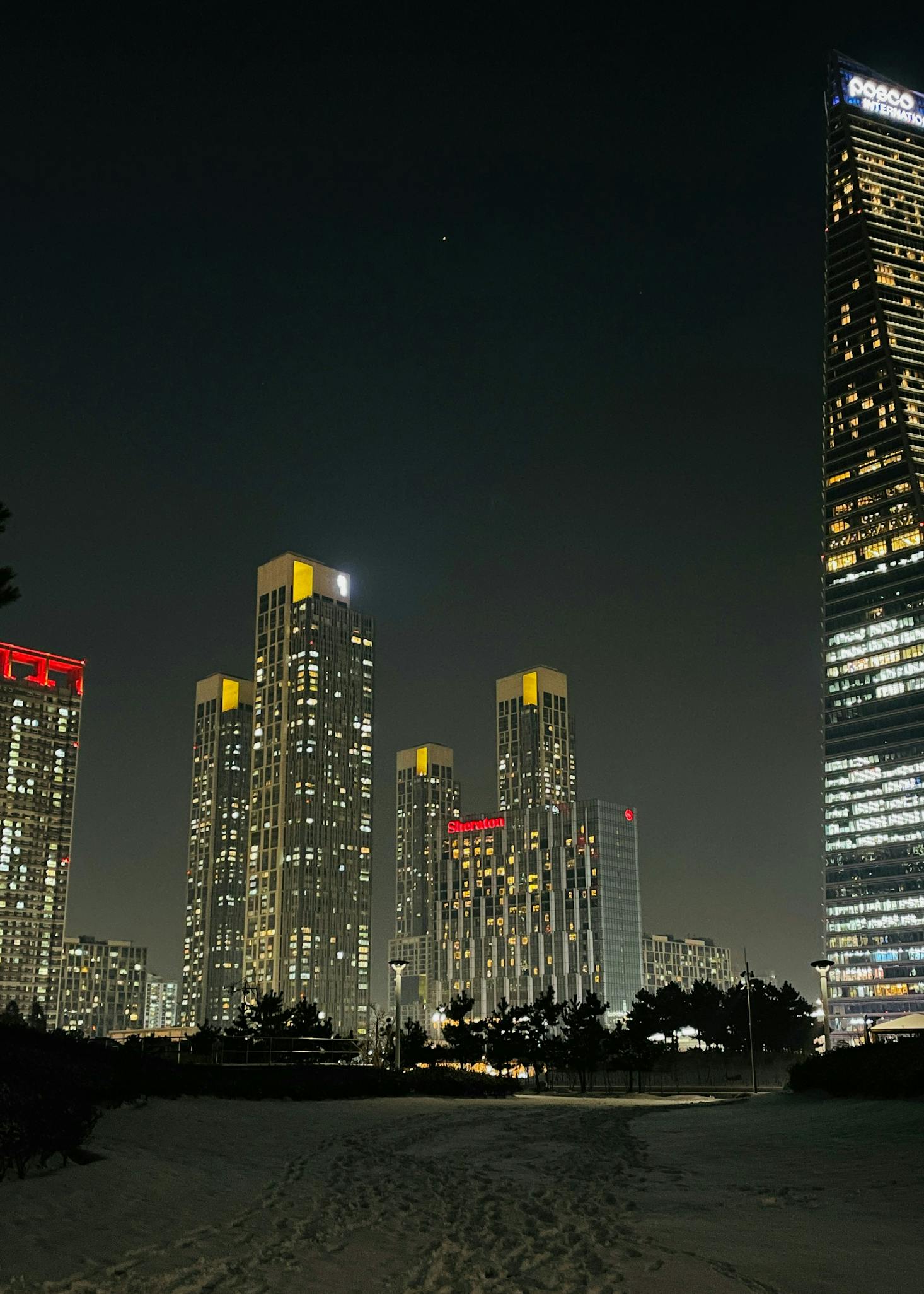 The lit up cityscape of Incheon, South Korea at night