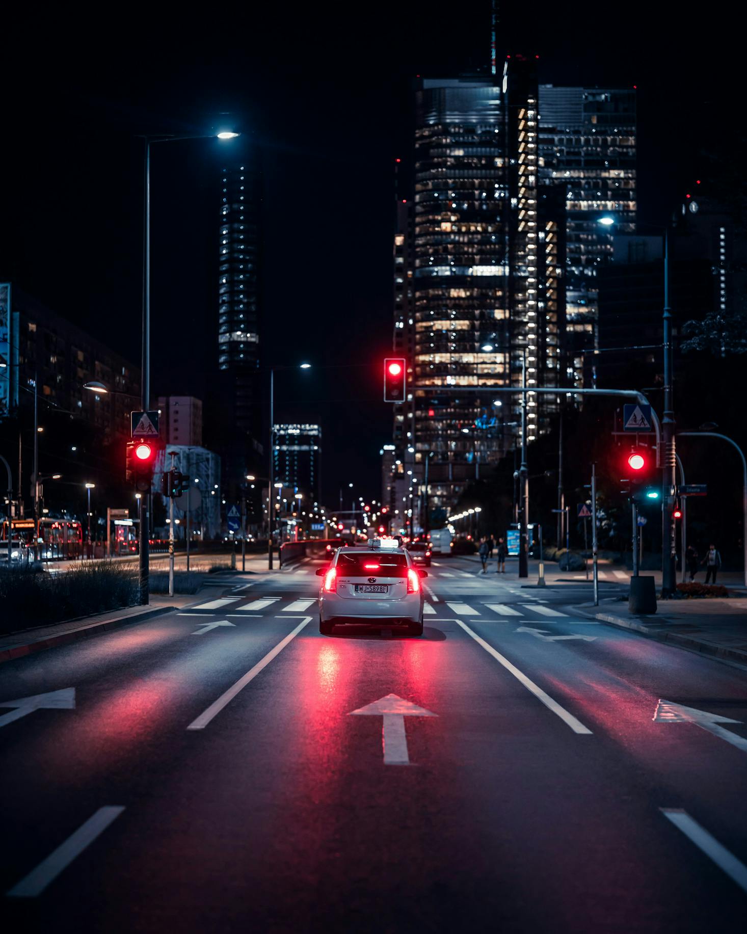 Car driving at night near Warsaw East Station