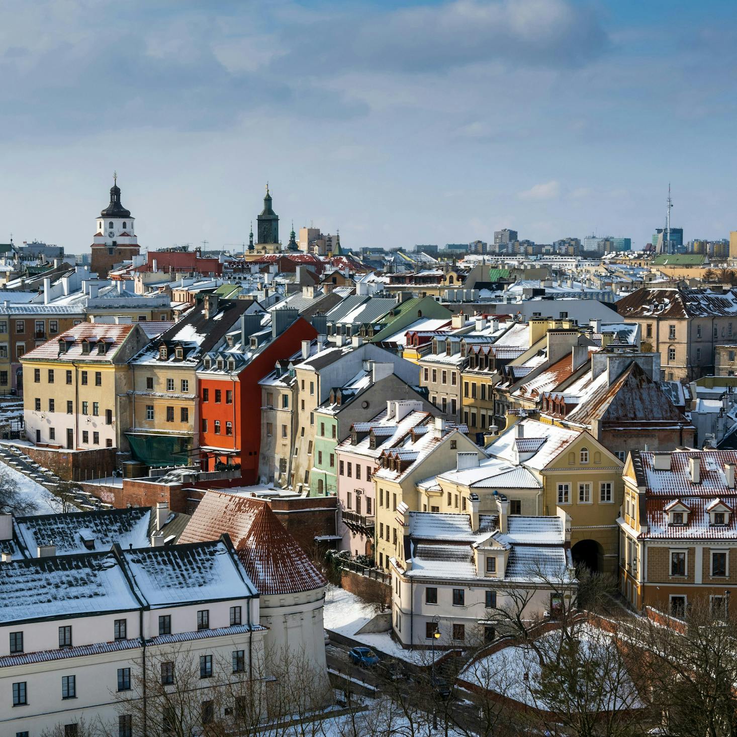 Snow on the roofs of buildings in Old Town Lublin near the bus station